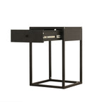 A modern black metal side table with a single drawer shown in the open position, revealing silver drawer hardware, set against a plain white background.