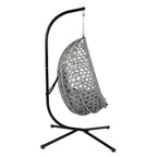 A gray woven hanging egg chair with a black metal stand and gray cushions, shown against a plain white background.