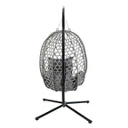A gray woven hanging egg chair with a black metal stand and gray cushions, shown against a plain white background.