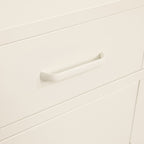 Close-up of the white sideboard's open drawer, showing the metal drawer runners and sliding mechanism.