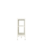A side view of a white metal & glass sideboard