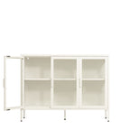 A white metal storage cabinet with three glass doors, one of which is open, showing an interior shelf. The cabinet stands on slim legs with small black feet.