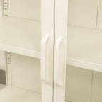 A close-up of a pair of white cabinet door handles.