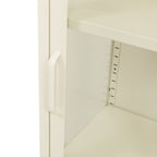 Close-up of a white storage cabinet door with a curved handle and an adjustable metal shelf bracket inside.