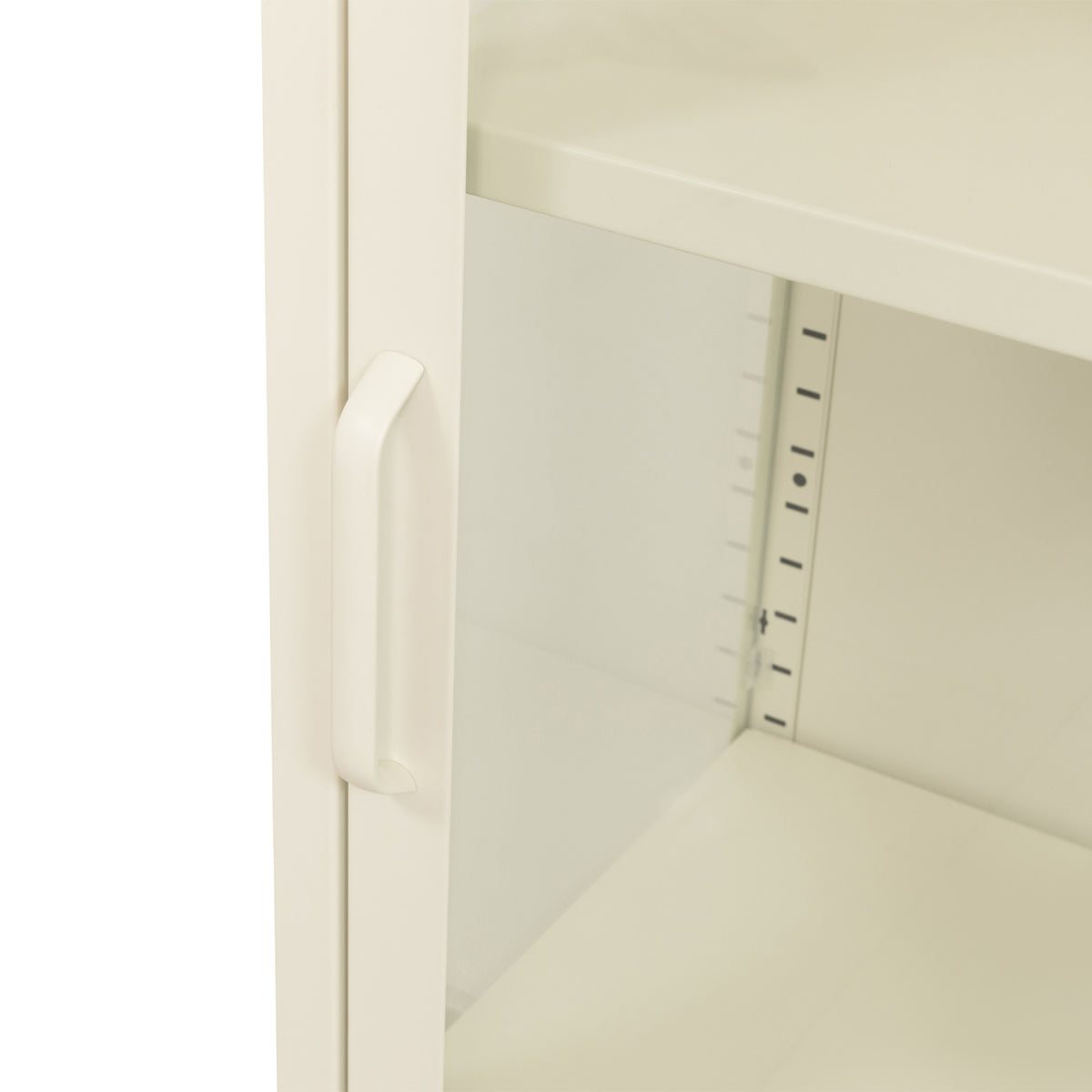 Close-up of a white storage cabinet door with a curved handle and an adjustable metal shelf bracket inside.