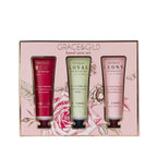Grace & Gild Luxury Florals hand care gift set containing three 50ml hand creams in Rose & Berries, Royal Lily & Vanilla and Peony & Bergamot, presented in a pink floral gift box.