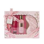 Grace & Gild Rose & Berries bath gift set in pink floral packaging containing body wash, hand cream, a pink satin sleep mask and decorative rose-shaped bath accessories.