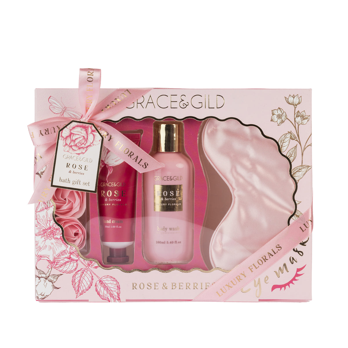 Grace & Gild Rose & Berries bath gift set in pink floral packaging containing body wash, hand cream, a pink satin sleep mask and decorative rose-shaped bath accessories.