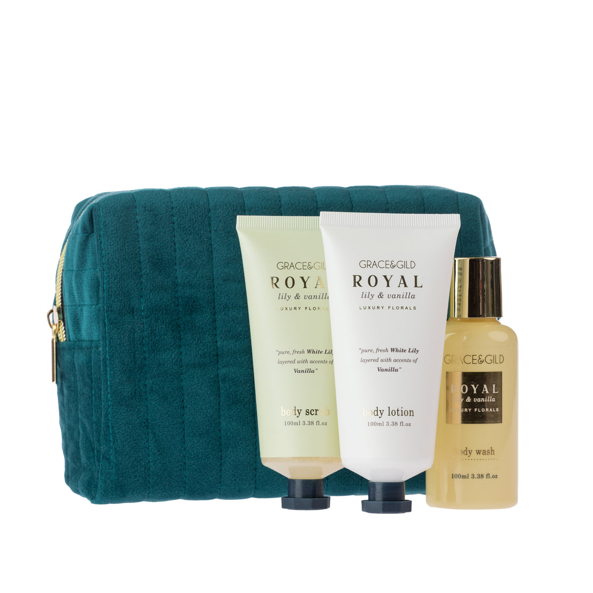 Royal Lily & Vanilla body scrub, body lotion and body wash displayed with the matching teal quilted cosmetic bag. Soft green, cream and gold tones give the set an elegant coordinated finish.