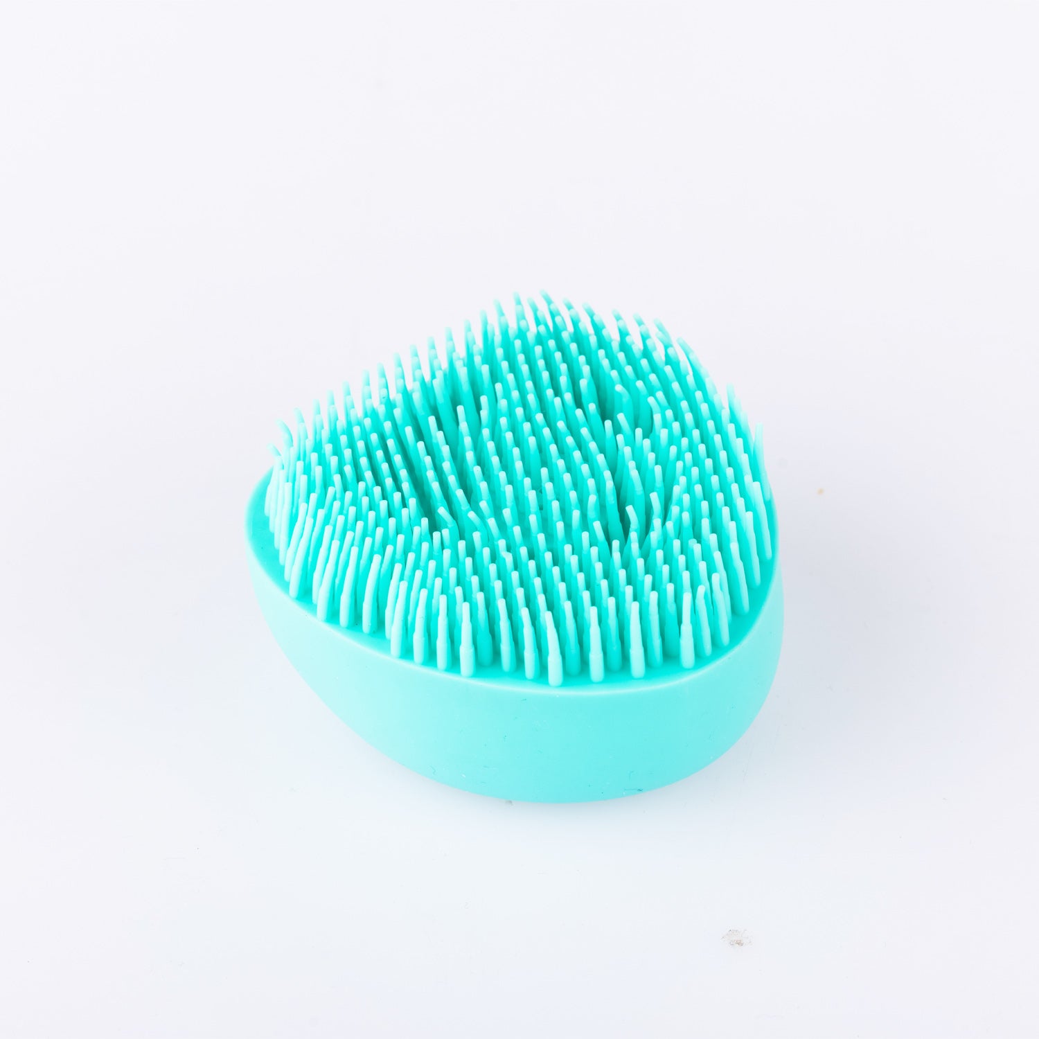 Grace & Gild Mae Silicone Shampoo Brush in sea green, showing the soft silicone bristles and easy-grip handle on a white background.