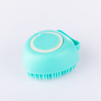 Grace & Gild Mae Silicone Shampoo Brush in sea green, showing the soft silicone bristles and easy-grip handle on a white background.