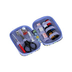 A lavender purple zippered sewing kit case shown open, containing scissors, thread spools, and other sewing tools, on a plain white background.