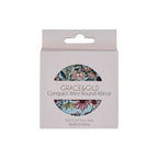 Grace & Gild compact mini round mirror in its original packaging, featuring a floral patterned mirror visible through a circular cutout on a light pink box.