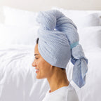 Grace & Gild Clementine Textured Hair Wrap in Blue, shown from the side with the wrap secured at the back.