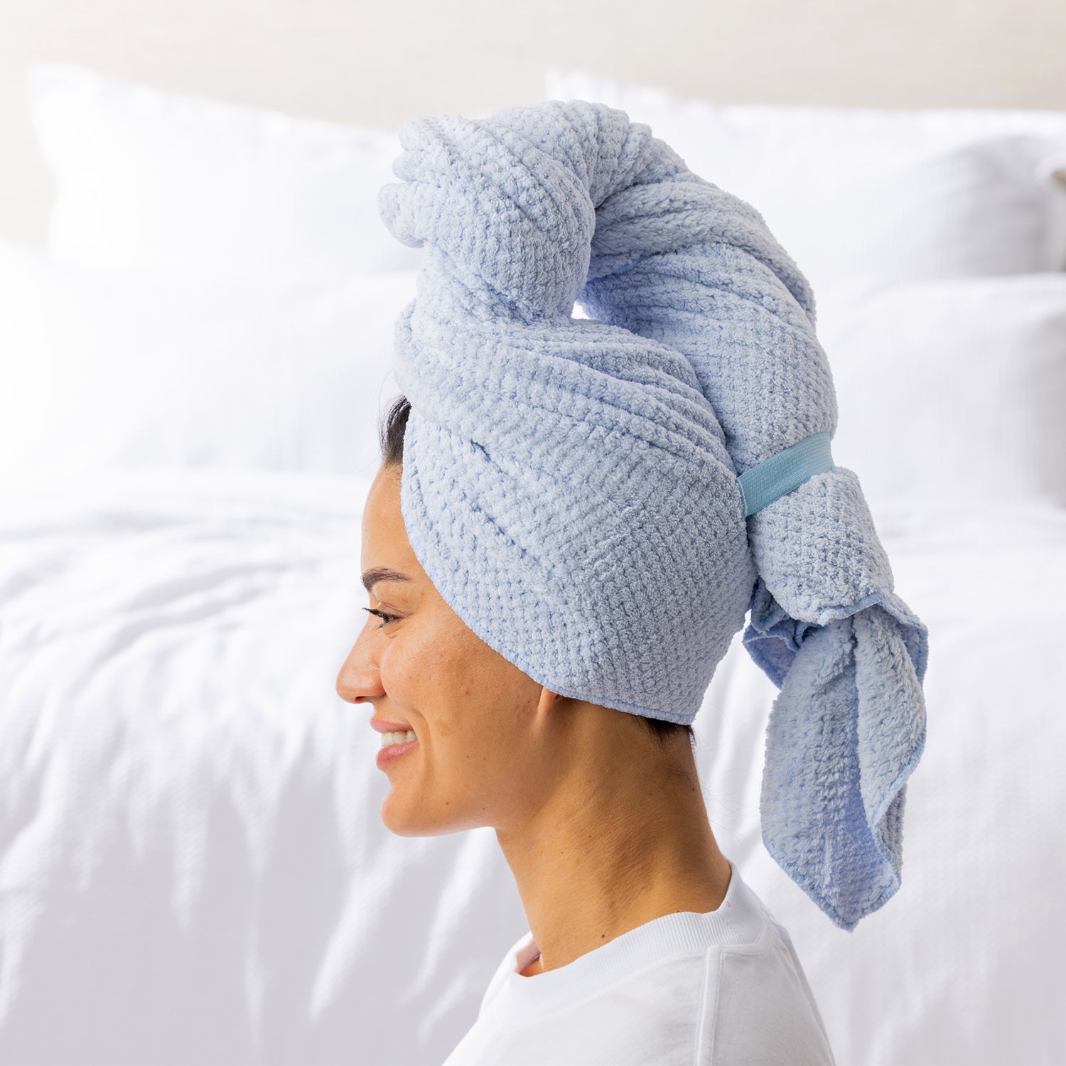 Grace & Gild Clementine Textured Hair Wrap in Blue, shown from the side with the wrap secured at the back.