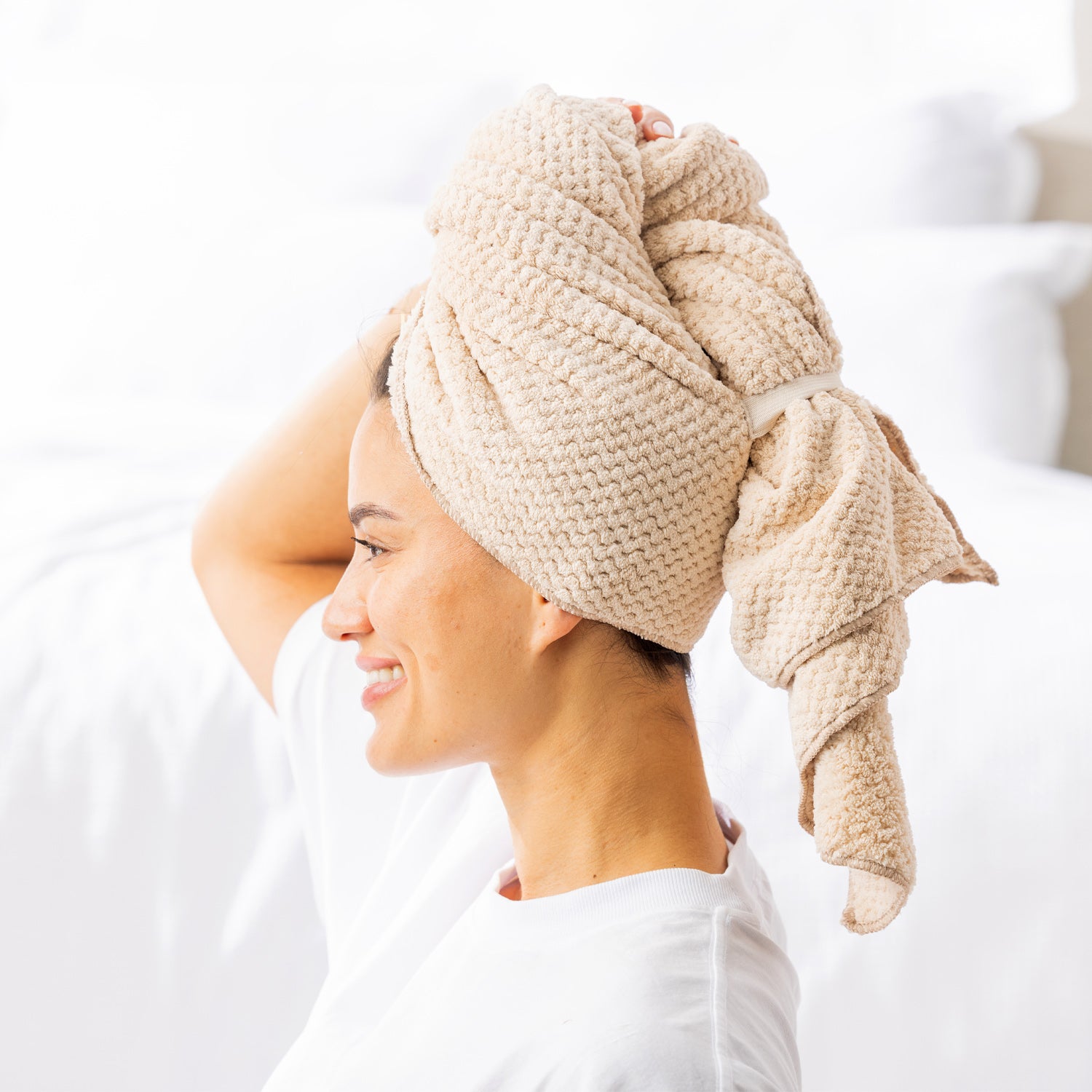 Grace & Gild Clementine Textured Hair Wrap in Natural, shown from the side with the wrap secured at the back.