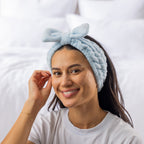 Grace & Gild Freya Pamper Set in Blue, showing a model wearing the soft blue headband.