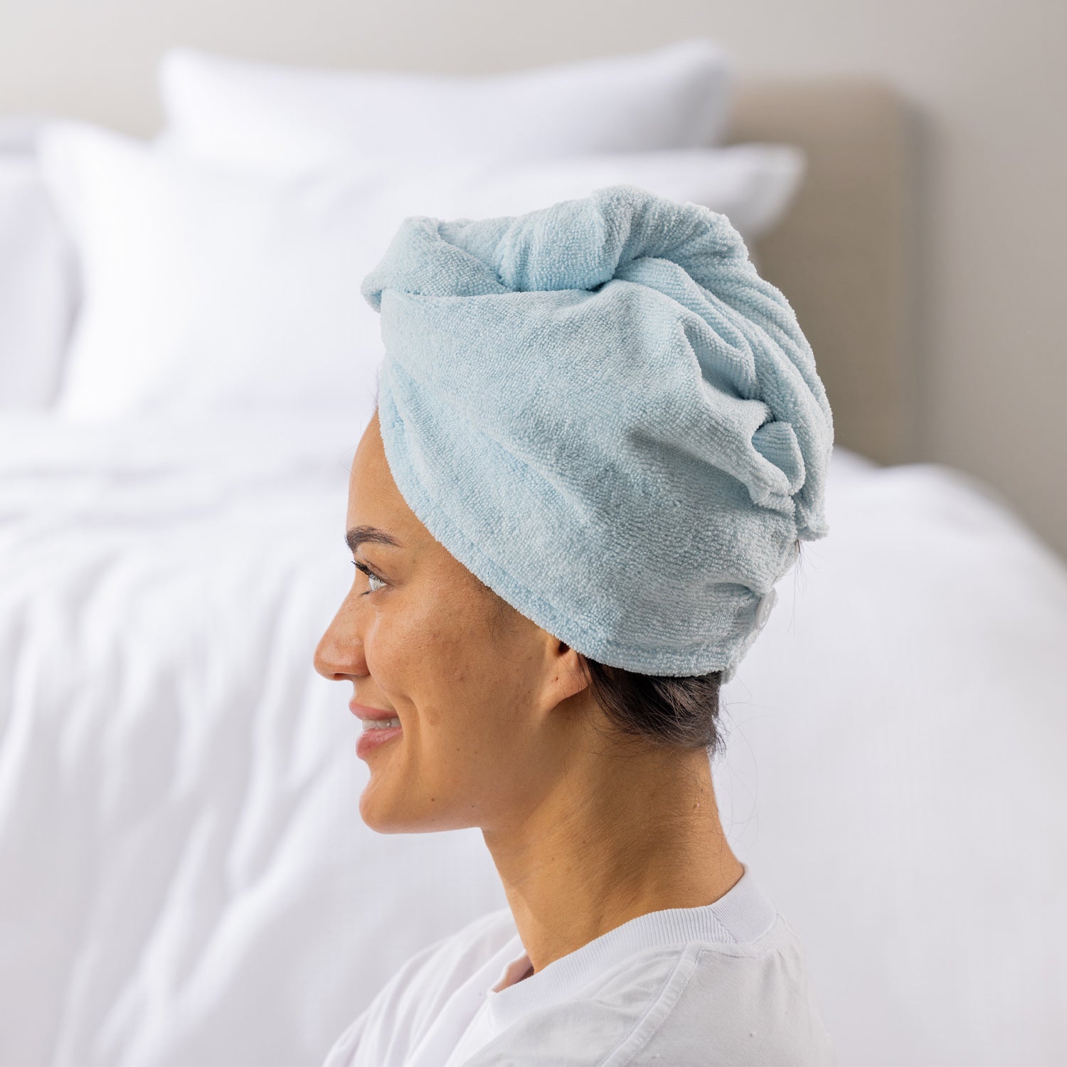 Grace & Gild Freya Pamper Set in Blue, showing a side view of the blue hair wrap on a model.