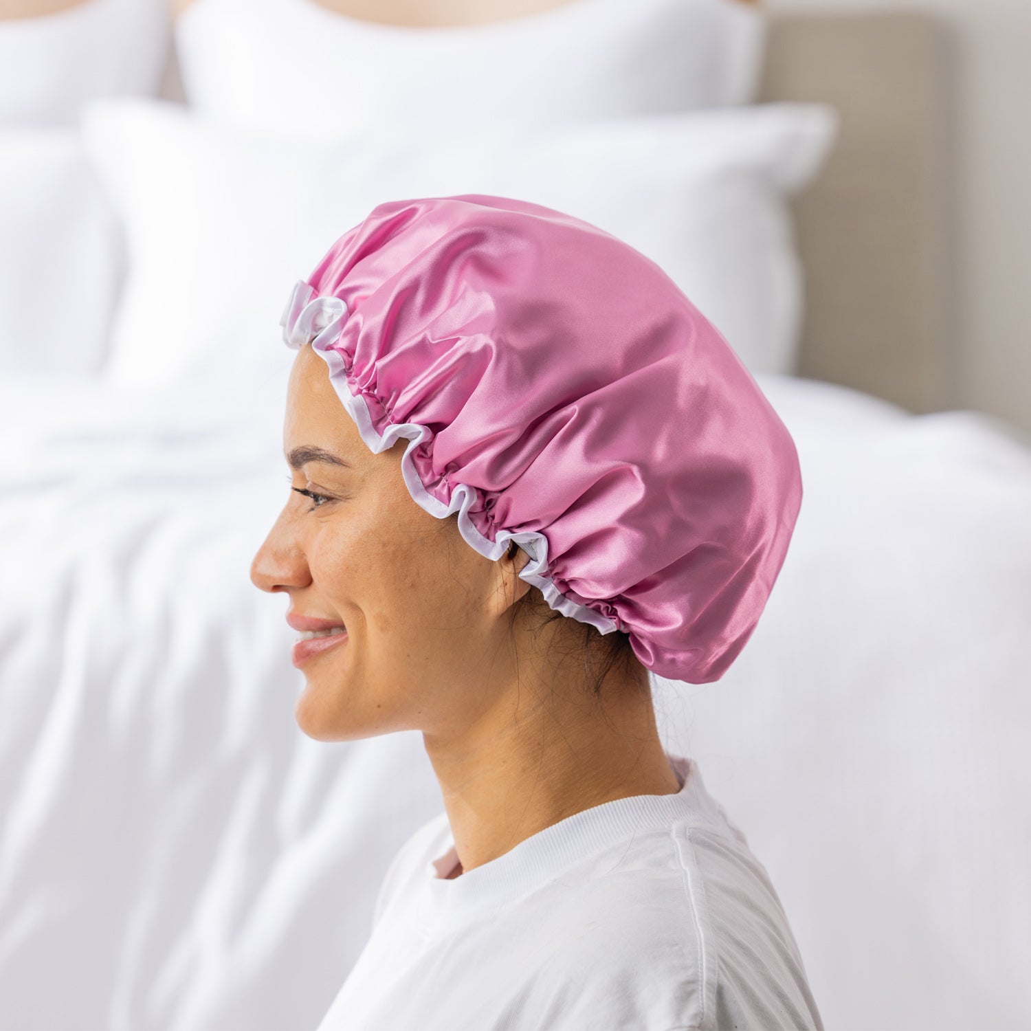 Grace & Gild Freya Pamper Set in rosewater, showing a side view of the blue satin shower cap on a model.
