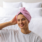 Grace & Gild Freya Pamper Set in rosewater, showing a model wearing the blue hair wrap.
