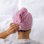Grace & Gild Freya Pamper Set in rosewater, showing the back of the blue hair wrap with button detail.