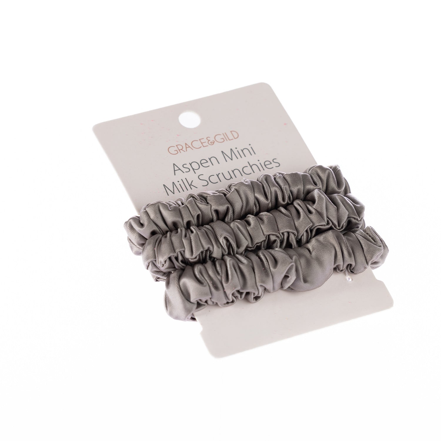 Grace & Gild Aspen Mini Milk Scrunchies 3 Pack in a satin cloud grey finish displayed on retail packaging.
