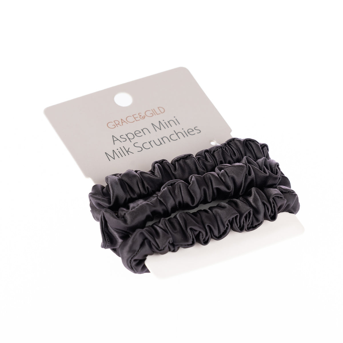 Grace & Gild Aspen Mini Milk Scrunchies 3 Pack in a satin moonscape grey finish displayed on retail packaging.