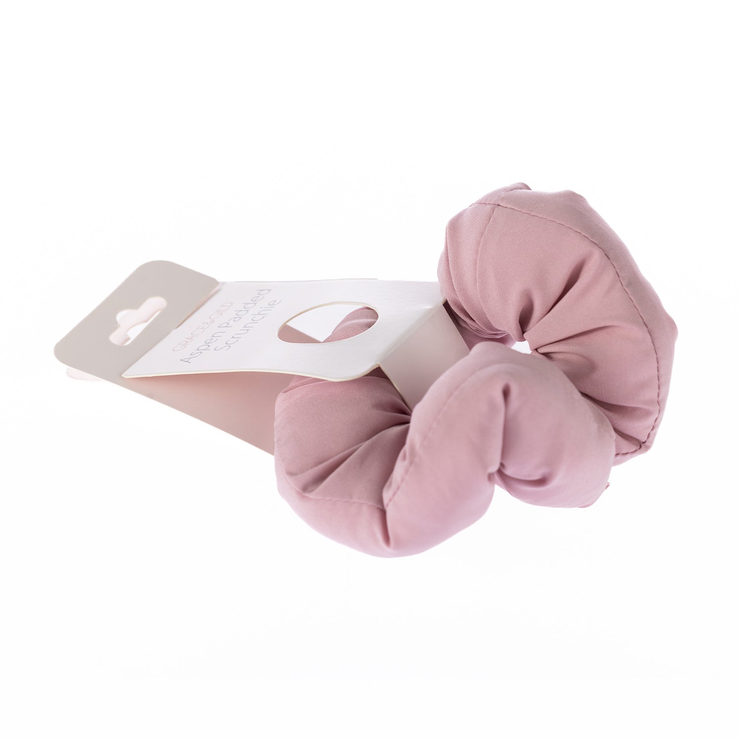 Grace & Gild Aspen Padded Scrunchie in a dusky pink colourway displayed on retail packaging.