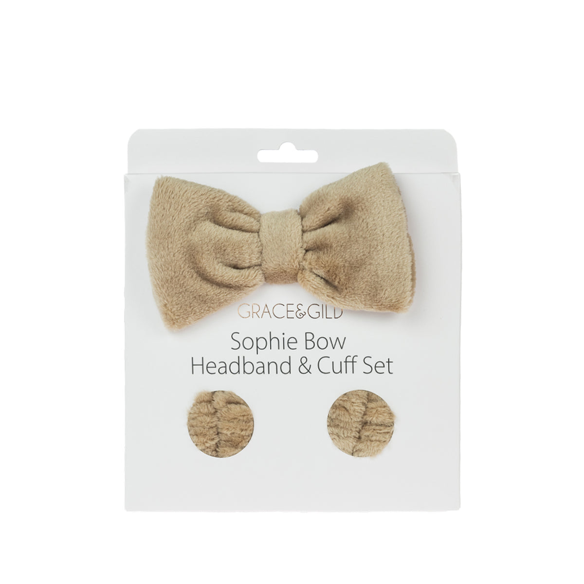 Grace & Gild Sophie Bow Headband & Cuff Set in natural, displayed in retail packaging with a plush bow headband and matching wrist cuffs.