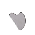 Grace & Gild Emmy Stainless Steel Gua Sha shown individually, featuring a smooth curved metal design on a white background.