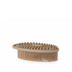 Grace & Gild Emmy Bath Brush in Natural shown from the side, highlighting the silicone massage nodes and flexible bristles.