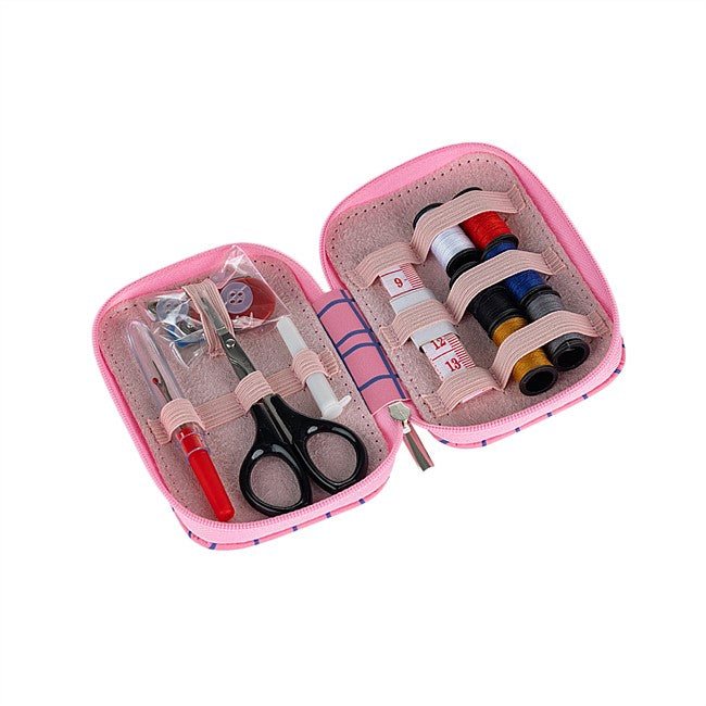 An open pink sewing and embroidery kit case on a white background, containing scissors, thread spools, needles, and other sewing accessories.