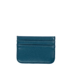 Deep Denim blue card holder featuring a textured finish, multiple card slots, neat stitching and rounded bottom corners.