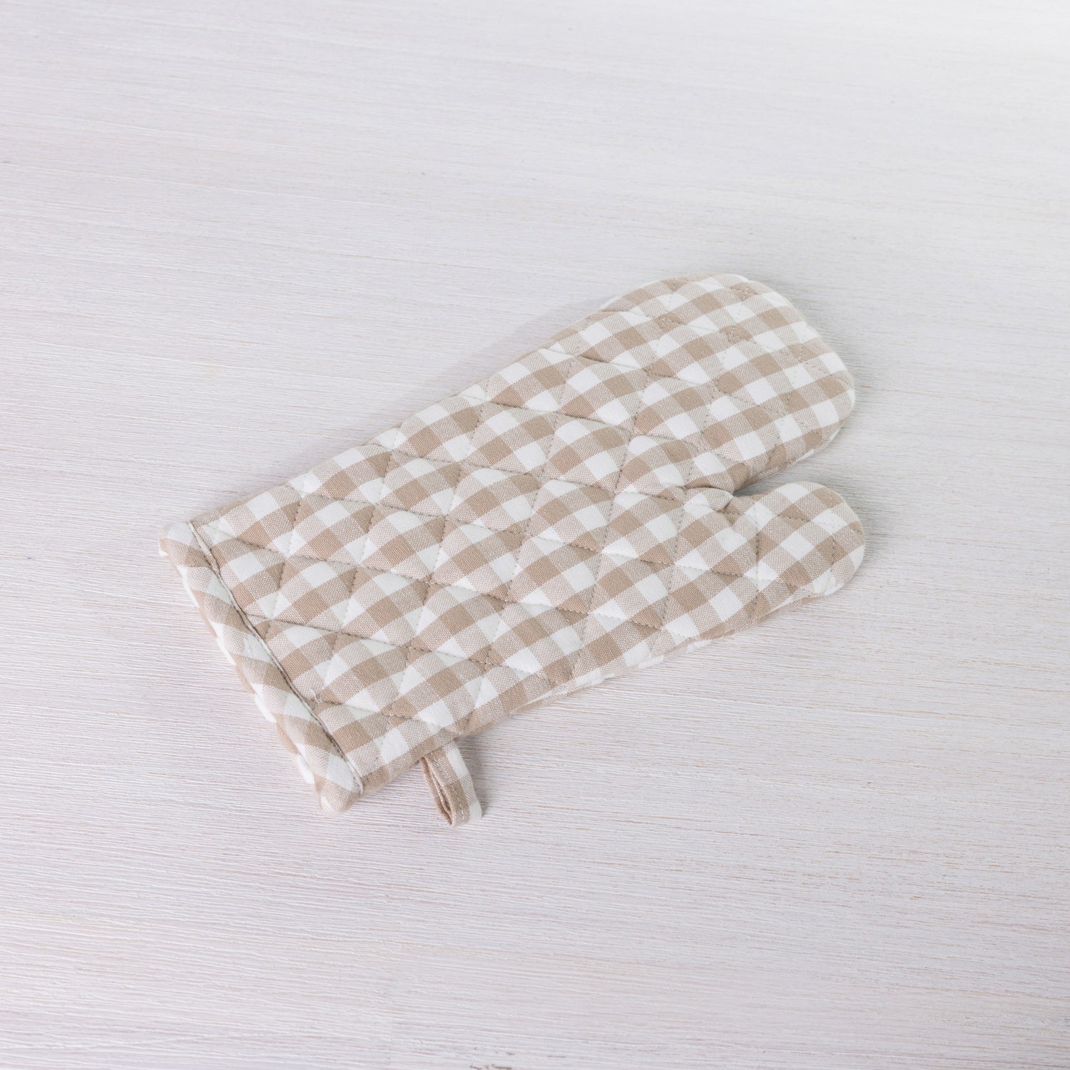 Gather Vichy Checks oven glove in Brown/Cream with quilted stitching and a hanging loop.
