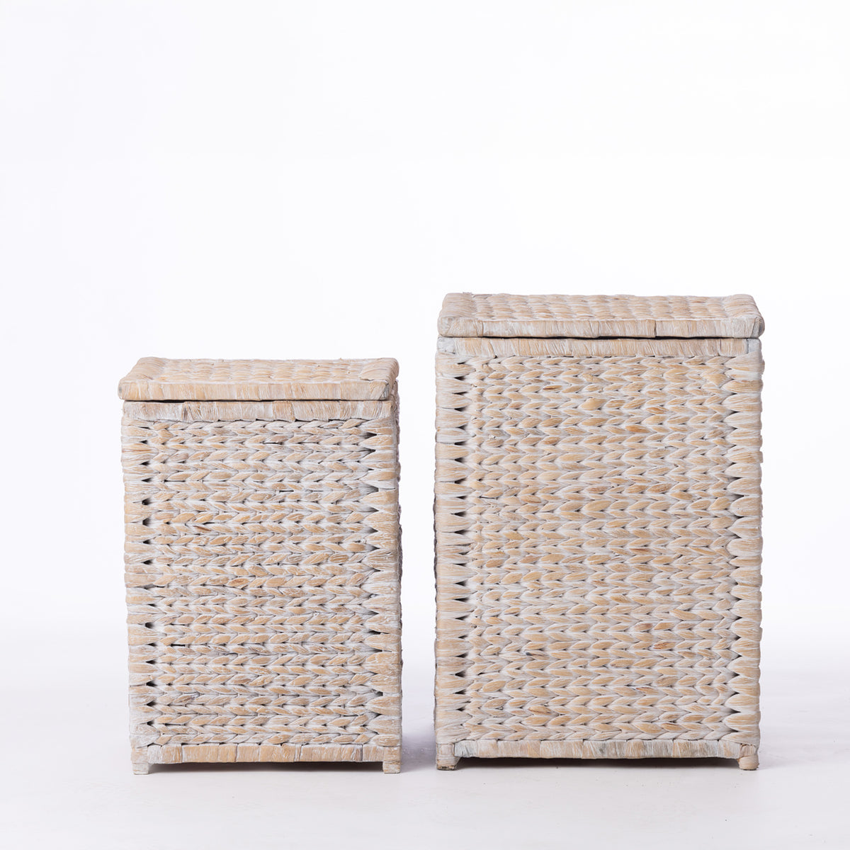 Cove Wilder Hamper Large and Small in White Wash displayed side by side, showing the coordinating woven storage range.