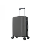 bb&b Travel Menton Suitcase in graphite, shown from a side angle with textured hard-shell exterior, spinner wheels, and an extended handle.