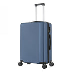 bb&b Travel Menton Suitcase in denim blue, shown from a side angle with textured hard-shell exterior, spinner wheels, and an extended handle.