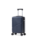 Small Navy hard shell suitcase with wheels and extendable handle on a white background.