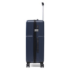 Navy hard shell suitcase with wheels and extendable handle on a white background.
