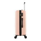 bb&b Travel Aspen Large Suitcase in blush, side view showing the zip closure, combination lock, side carry handle and extended telescopic handle.