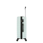 Rear view of the Medium mint hard-shell suitcase with diagonal ribbed detailing, telescopic handle and spinner wheels.
