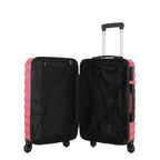 Open view of the Medium raspberry hard-shell suitcase showing the black lined interior, zippered divider compartment and adjustable packing straps.