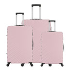 Three Pink Blush hard-shell suitcases in Small, Medium and Large sizes, featuring diagonal ribbed detailing, telescopic handles and spinner wheels.