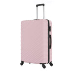 Angled view of the Large Pink Blush hard-shell suitcase showing the ribbed shell, zip closure, side carry handle and spinner wheels.