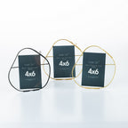Three metal photo frames with '4x6' labels on a white background