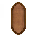 Rear view of a full-length decorative mirror featuring a shaped backing board, natural wood frame, and integrated wall mounting hardware, displayed against a light grey background.
