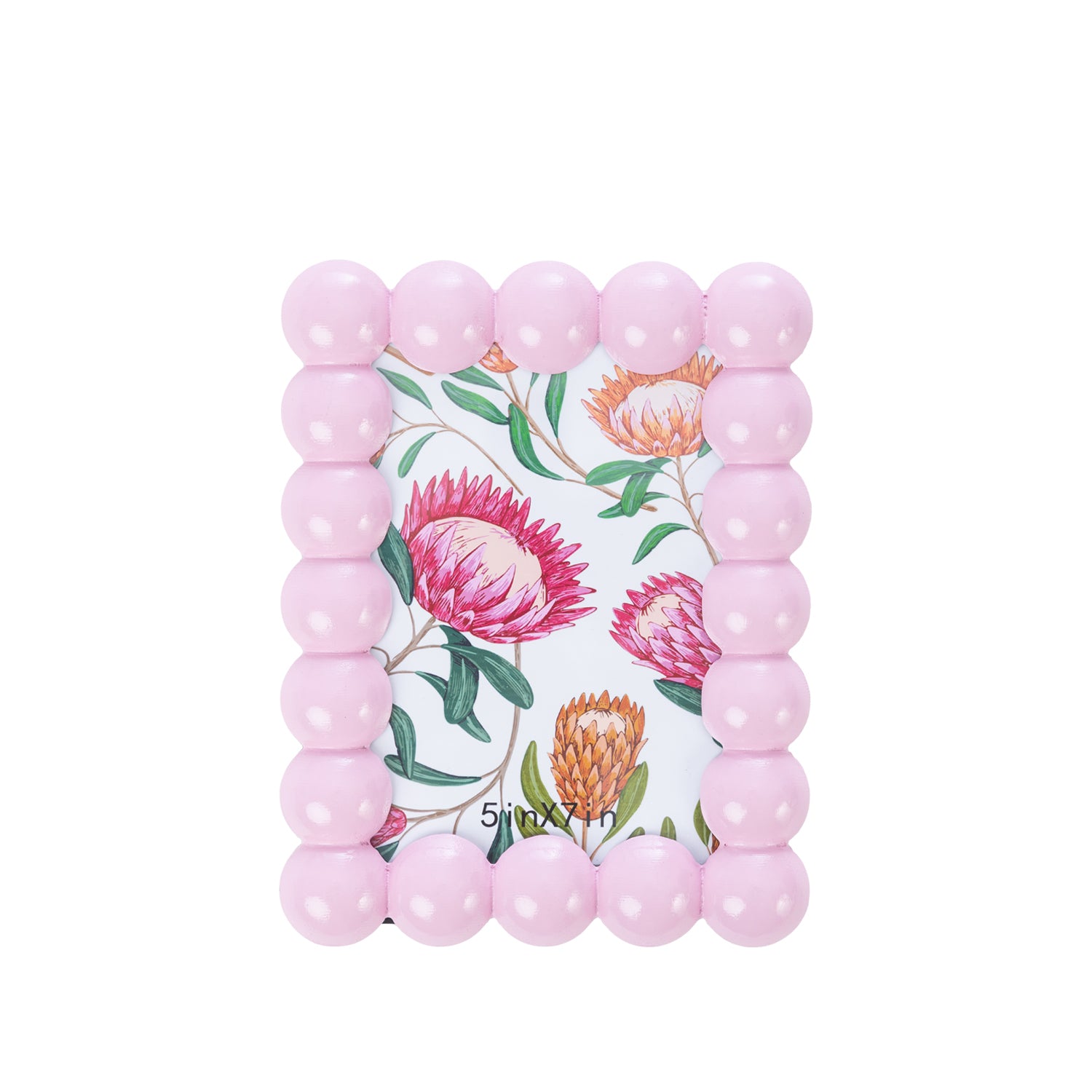 Pink bobble-style photo frame with rounded bead detailing around the border and a colourful floral print displayed inside, shown on a white background.