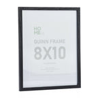 A black wood-look 8 × 10 photo frame with a wide white mat and subtle timber grain finish provides a timeless way to display your favourite photographs or artwork.