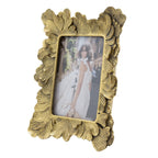 Design Republique Duchess Large Photo Frame in gold with an ornate leaf-inspired frame, shown displaying a portrait photograph.