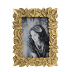 Design Republique Leaves Gold Photo Frame with an intricate leaf-pattern border in an antique gold finish, shown against a white background.